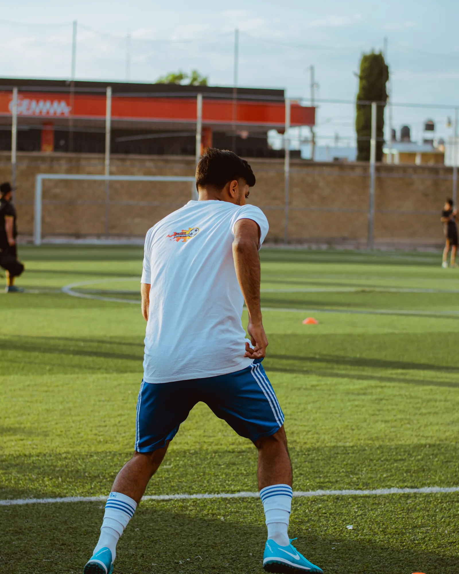 Young football athlete completing speed and agility training