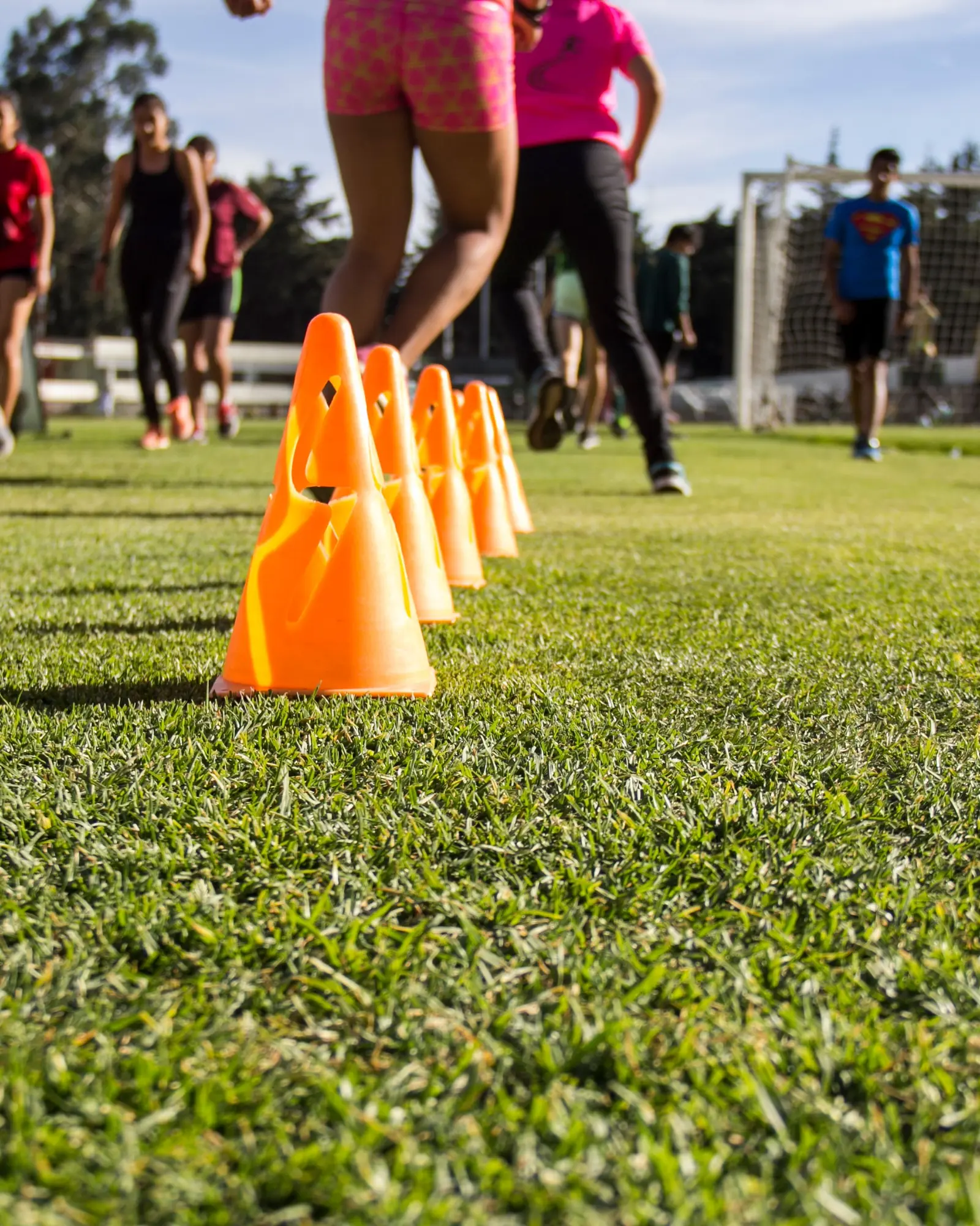 Football team completing structured group performance training